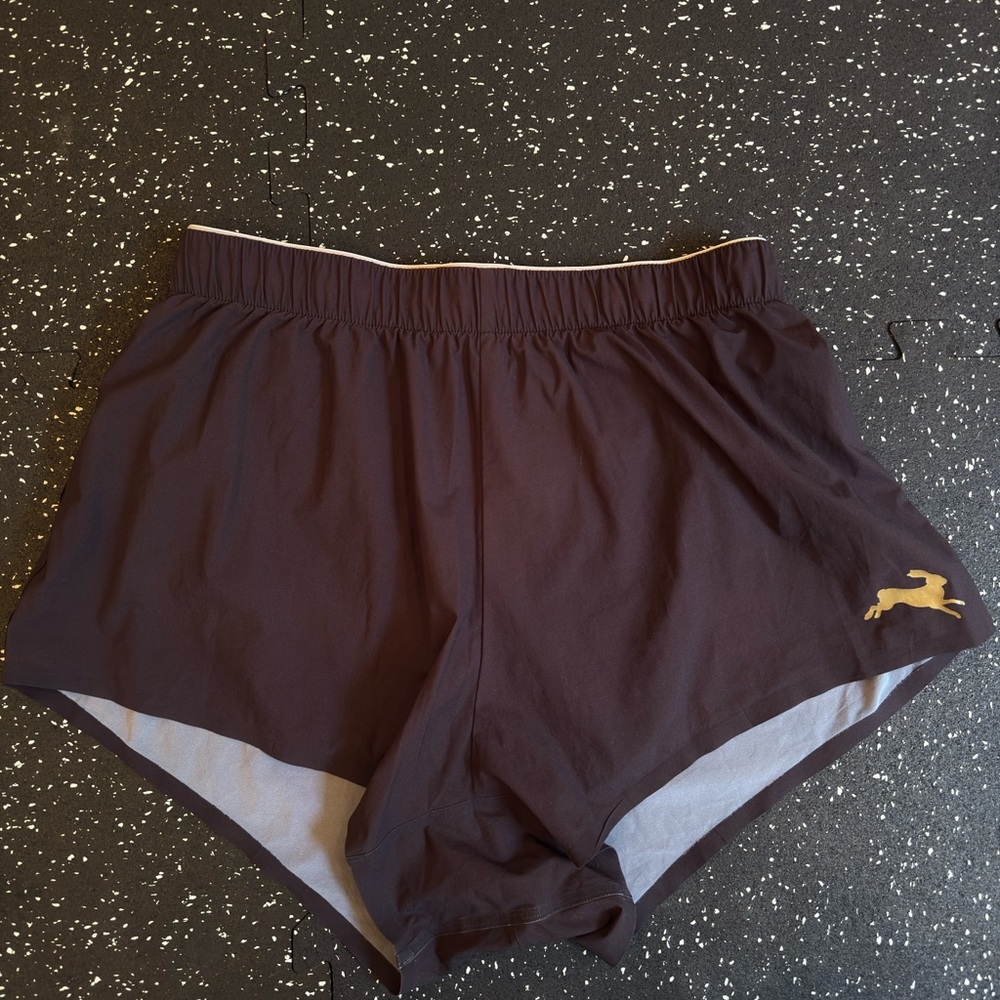 Tracksmith black strata shorts